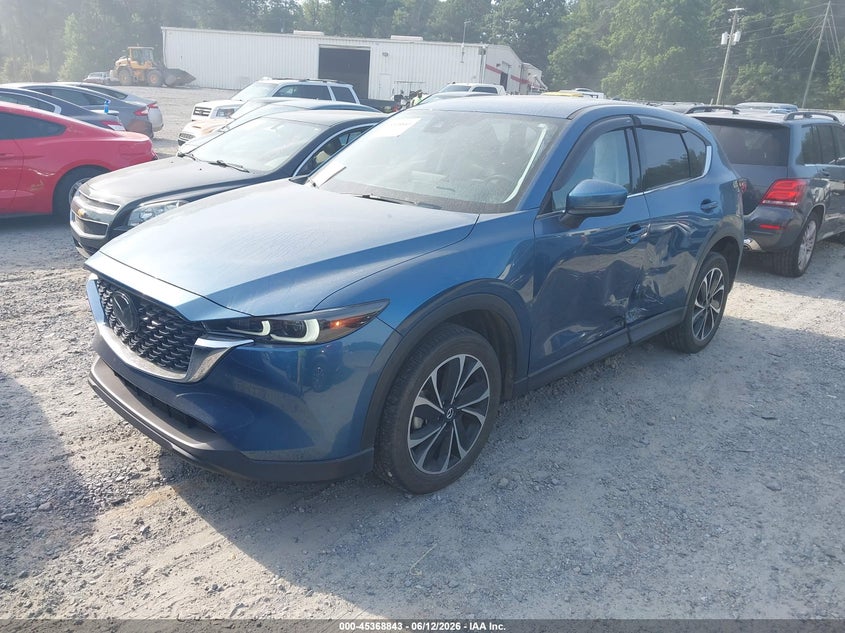 2022 Mazda Cx-5 VIN JM3KFBDM4N1582144 IAAI salvage auction — SIDE, Salvage Title, sold $7,100 on 2026-07-26 (photo 2)