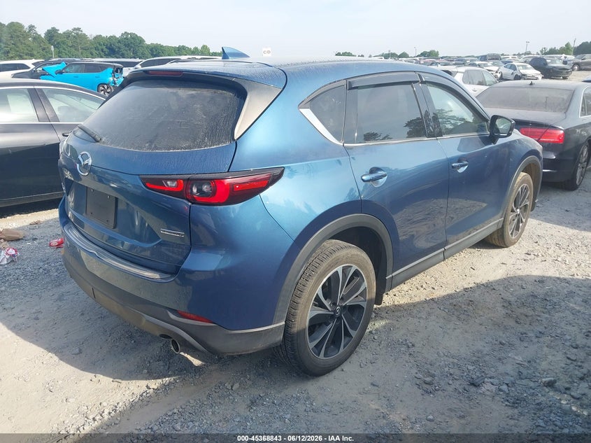 2022 Mazda Cx-5 VIN JM3KFBDM4N1582144 IAAI salvage auction — SIDE, Salvage Title, sold $7,100 on 2026-07-26 (photo 4)