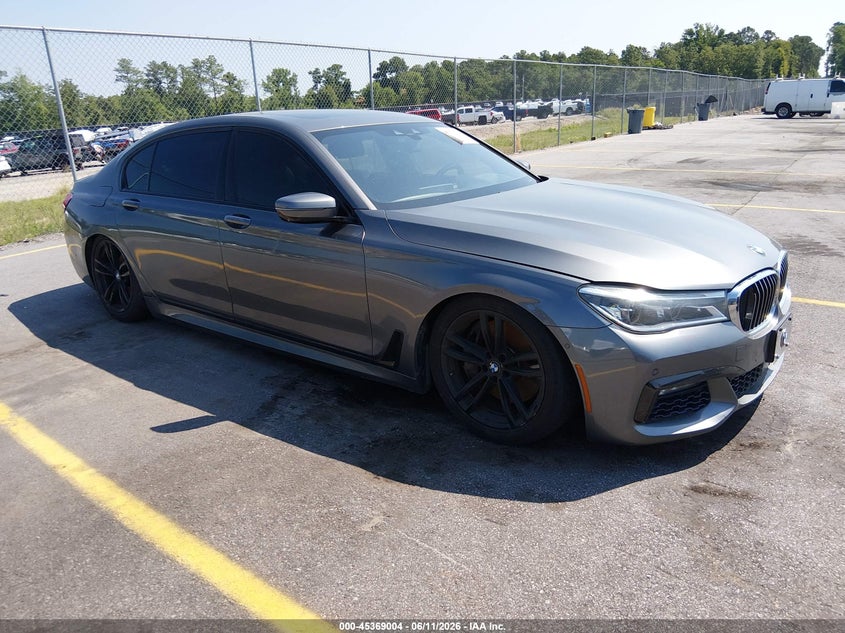 2017 BMW 7er VIN WBA7F2C33HG422777 IAAI salvage auction — SUSPENSION, Repossession Paperwork (Georgia), sold $25 on 2026-07-29 (photo 1)