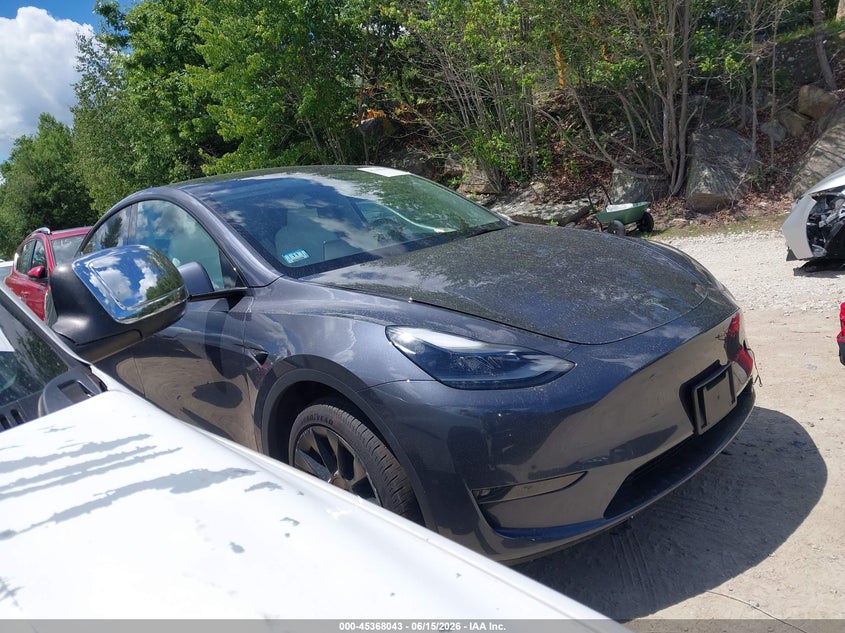 2023 Tesla Model y VIN 7SAYGDEE7PF878310 IAAI salvage auction — REAR END, Salvage Title, sold $10,000 on 2026-07-21 (photo 1)
