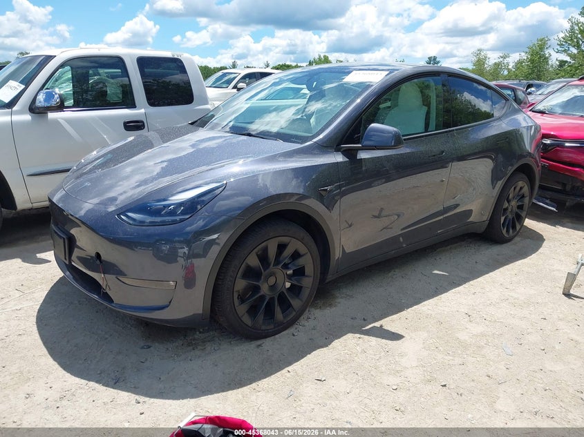 2023 Tesla Model y VIN 7SAYGDEE7PF878310 IAAI salvage auction — REAR END, Salvage Title, sold $10,000 on 2026-07-21 (photo 2)