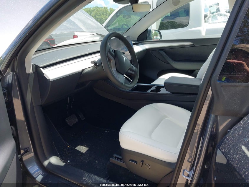 2023 Tesla Model y VIN 7SAYGDEE7PF878310 IAAI salvage auction — REAR END, Salvage Title, sold $10,000 on 2026-07-21 (photo 5)