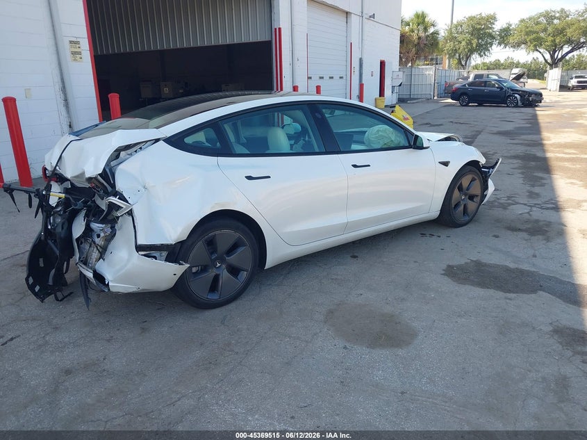 2022 Tesla Model 3 VIN 5YJ3E1EA5NF329727 IAAI salvage auction — FRONT END, Certificate Of Destruction (Florida), sold $2,350 on 2026-07-18 (photo 4)