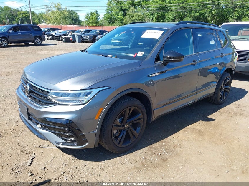 2023 Volkswagen Tiguan VIN 3VV8B7AX7PM127063 IAAI salvage auction — REAR END, Salvage Title, sold $8,300 on 2026-08-14 (photo 2)