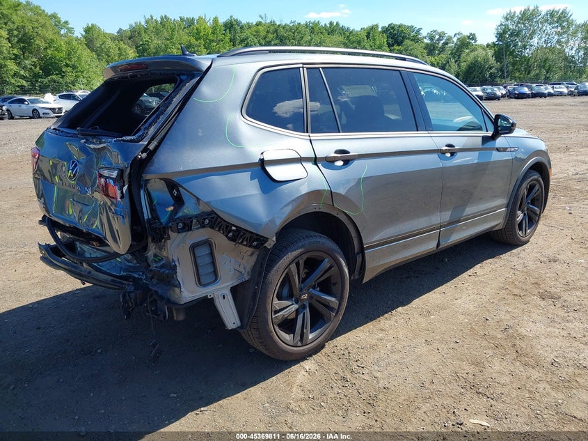 2023 Volkswagen Tiguan VIN 3VV8B7AX7PM127063 IAAI salvage auction — REAR END, Salvage Title, sold $8,300 on 2026-08-14 (photo 4)