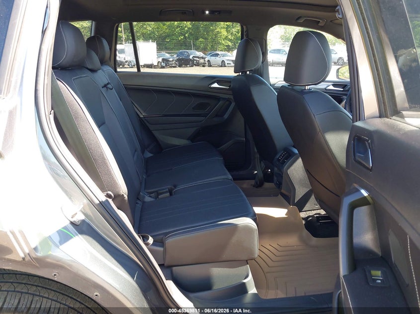 2023 Volkswagen Tiguan VIN 3VV8B7AX7PM127063 IAAI salvage auction — REAR END, Salvage Title, sold $8,300 on 2026-08-14 (photo 8)