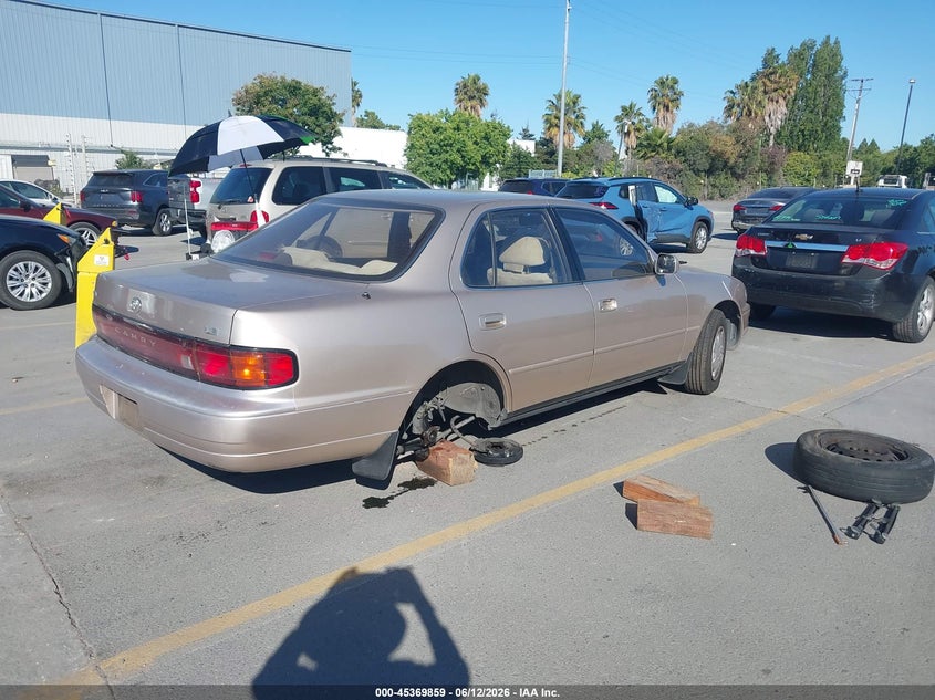 1994 Toyota Camry VIN JT2SK12E0R0194617 IAAI salvage auction — LEFT REAR, Salvage (California), sold $275 on 2026-07-13 (photo 4)