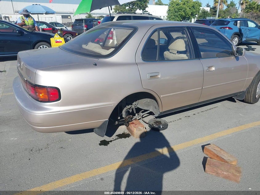 1994 Toyota Camry VIN JT2SK12E0R0194617 IAAI salvage auction — LEFT REAR, Salvage (California), sold $275 on 2026-07-13 (photo 6)
