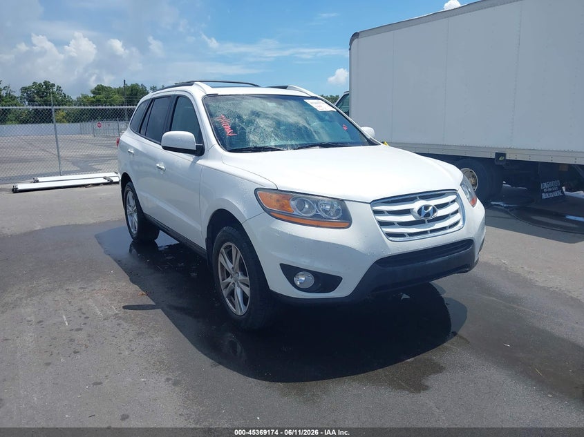 2011 Hyundai Santa fe VIN 5XYZK3AB5BG043832 IAAI salvage auction — SIDE, Clear (Florida), sold $2,350 on 2026-07-13 (photo 1)