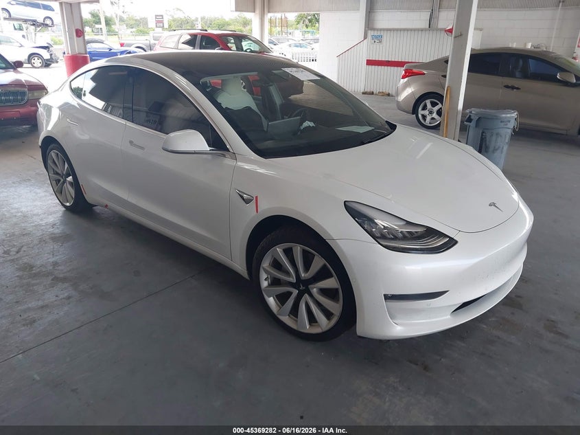 2020 Tesla Model 3 VIN 5YJ3E1EB6LF628777 IAAI salvage auction — LEFT SIDE, Rebuildable (Florida), sold $6,500 on 2026-07-23 (photo 1)