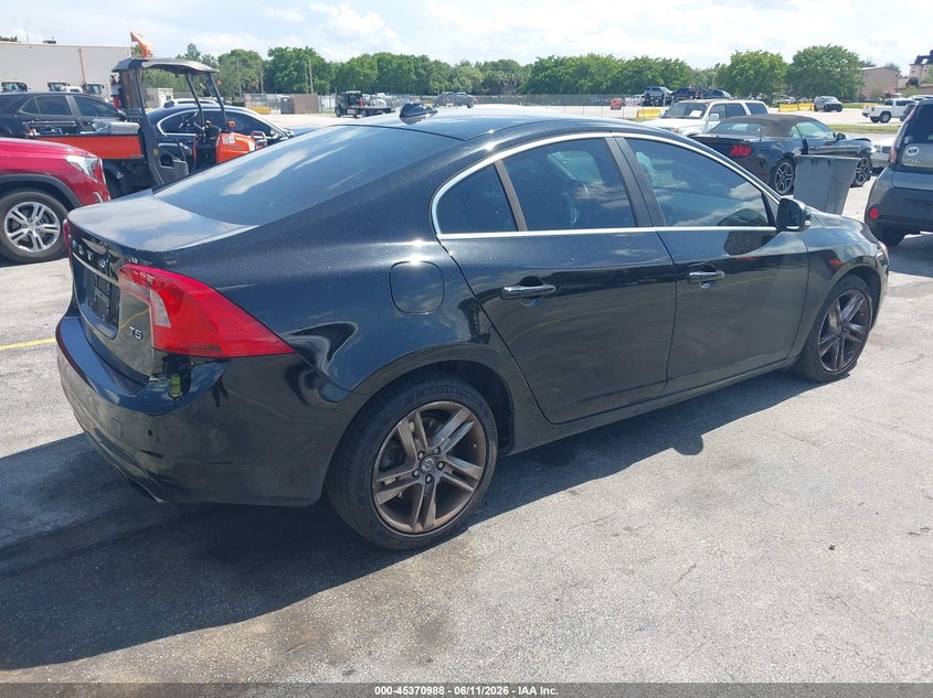 2015 Volvo S60 VIN YV140MFC4F1317884 IAAI salvage auction — NORMAL WEAR, Clear (Florida), sold $475 on 2026-07-09 (photo 4)
