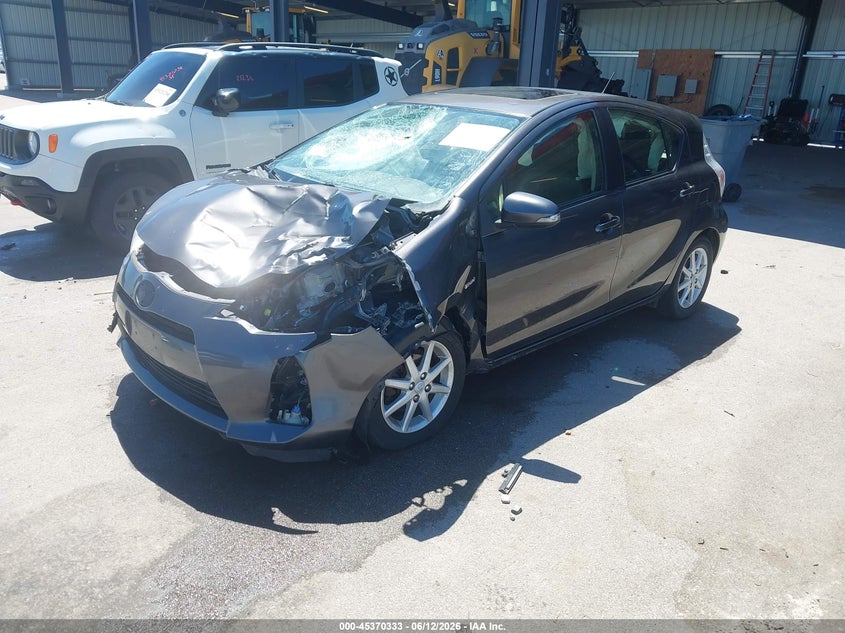 2014 Toyota Prius c VIN JTDKDTB37E1076192 IAAI salvage auction — FRONT END, Certificate Of Title (Nebraska), sold $700 on 2026-07-23 (photo 2)