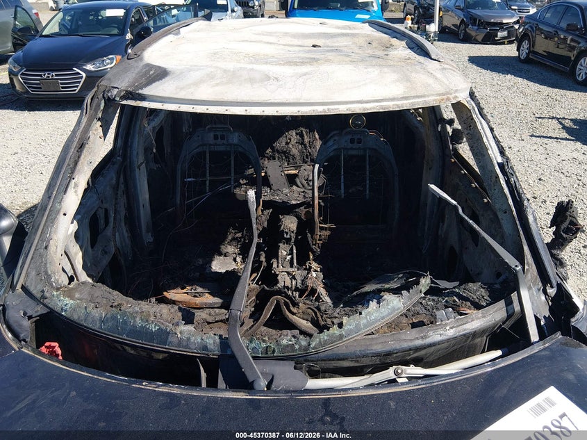 2016 Mini Countryman VIN WMWZB3C55GWR49235 IAAI salvage auction — INTERIOR BURN, Bill Of Sale - Parts Only (Washington), sold $25 on 2026-07-22 (photo 6)