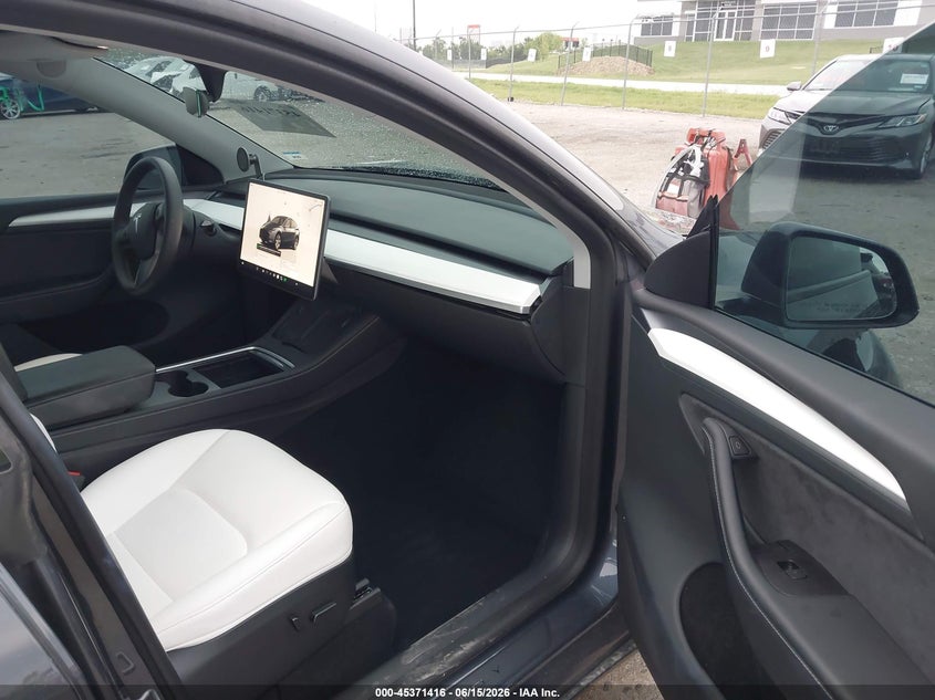 2023 Tesla Model y VIN 7SAYGDEE3PA091710 IAAI salvage auction — FRONT END, Salvage (California), sold $12,500 on 2026-07-14 (photo 5)