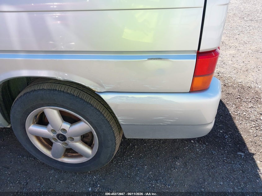 2003 Volkswagen Eurovan VIN WV2MB47013H034643 IAAI salvage auction — NORMAL WEAR, Release Of Interest (Washington), sold $775 on 2026-07-21 (photo 6)