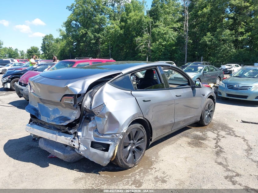 2025 Tesla Model y VIN 7SAYGDED3SF265651 IAAI salvage auction — REAR END, Salvage - Greater Than 75% (Maryland), sold $7,000 on 2026-07-11 (photo 4)