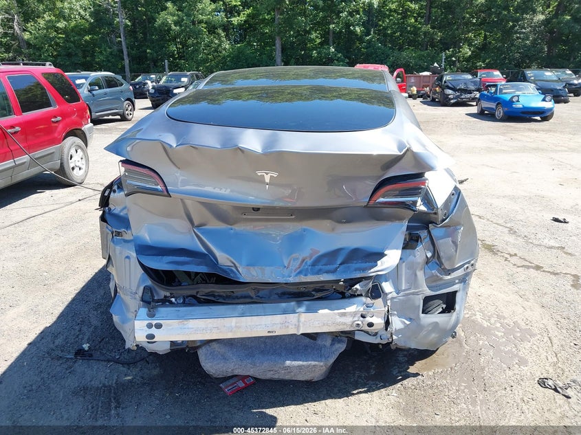 2025 Tesla Model y VIN 7SAYGDED3SF265651 IAAI salvage auction — REAR END, Salvage - Greater Than 75% (Maryland), sold $7,000 on 2026-07-11 (photo 6)