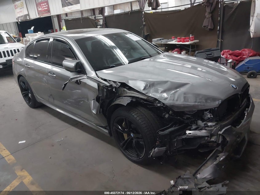 2018 BMW M5 VIN WBSJF0C59JB283636 — IAAI salvage auction photo