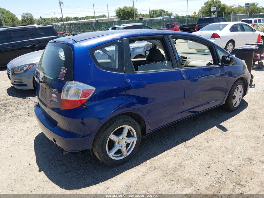 2009 Honda Fit VIN JHMGE882X9S051896 IAAI salvage auction — NORMAL WEAR, Clear (Kansas), sold $750 on 2026-07-17 (photo 4)