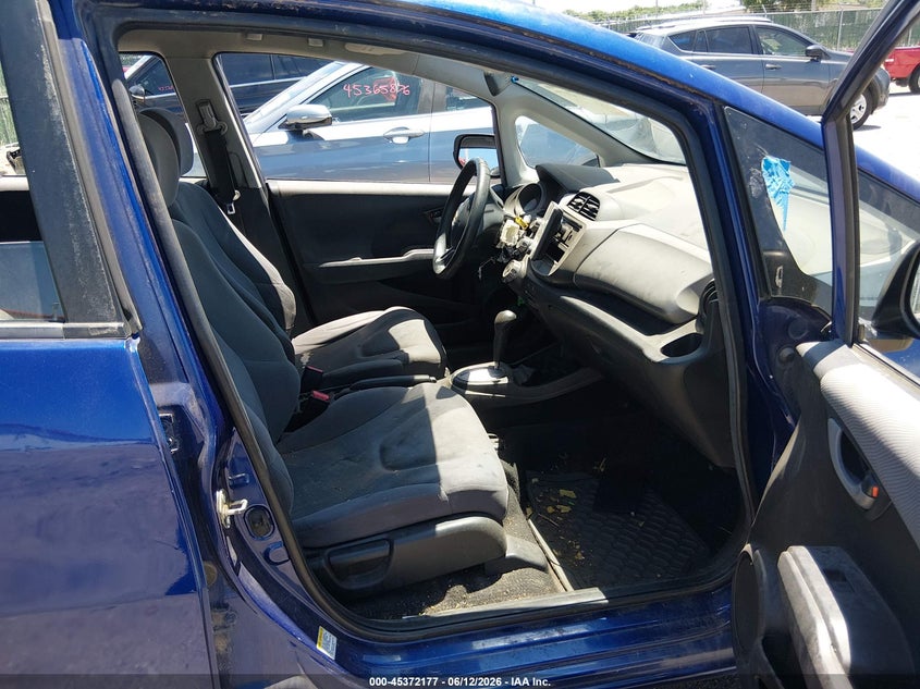 2009 Honda Fit VIN JHMGE882X9S051896 IAAI salvage auction — NORMAL WEAR, Clear (Kansas), sold $750 on 2026-07-17 (photo 5)