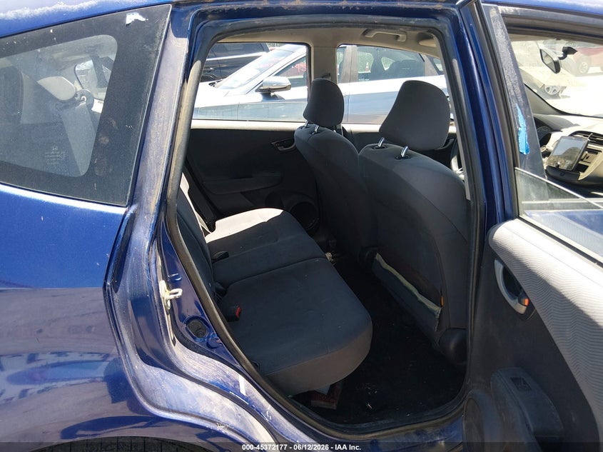 2009 Honda Fit VIN JHMGE882X9S051896 IAAI salvage auction — NORMAL WEAR, Clear (Kansas), sold $750 on 2026-07-17 (photo 8)