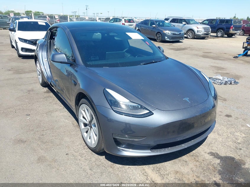 2023 Tesla Model 3 VIN 5YJ3E1EAXPF652870 IAAI salvage auction — SIDE, Salvage (California), sold $7,400 on 2026-07-16 (photo 1)
