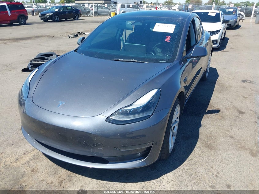 2023 Tesla Model 3 VIN 5YJ3E1EAXPF652870 IAAI salvage auction — SIDE, Salvage (California), sold $7,400 on 2026-07-16 (photo 2)