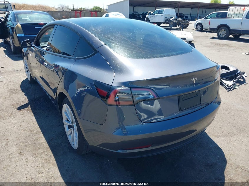 2023 Tesla Model 3 VIN 5YJ3E1EAXPF652870 IAAI salvage auction — SIDE, Salvage (California), sold $7,400 on 2026-07-16 (photo 3)