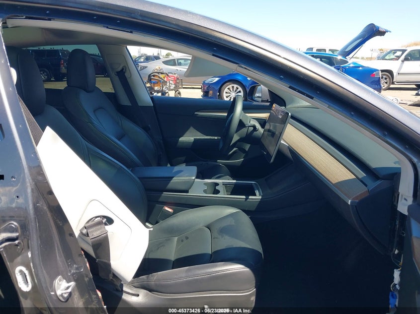 2023 Tesla Model 3 VIN 5YJ3E1EAXPF652870 IAAI salvage auction — SIDE, Salvage (California), sold $7,400 on 2026-07-16 (photo 5)