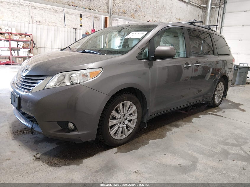 2014 Toyota Sienna VIN 5TDDK3DCXES082163 IAAI salvage auction — NORMAL WEAR, Original (Alaska), sold $8,450 on 2026-07-10 (photo 2)