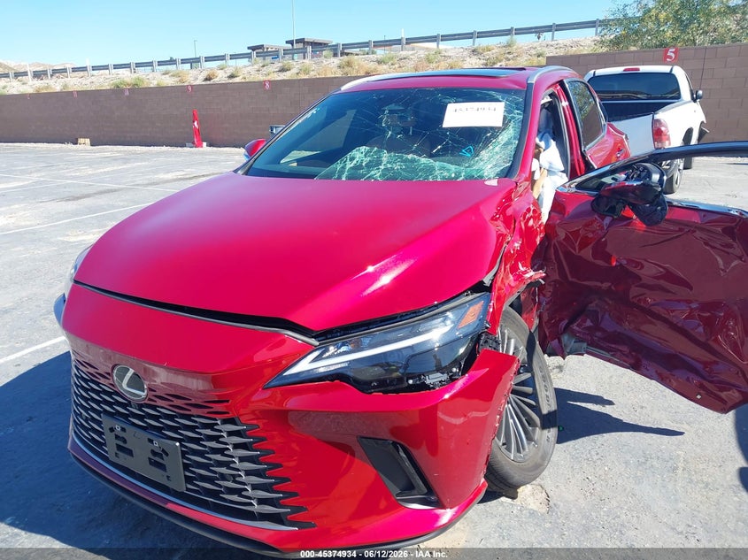 2025 Lexus Rx VIN 2T2BBMCA2SC102807 IAAI salvage auction — SIDE, Salvage Title, sold $18,350 on 2026-08-24 (photo 2)