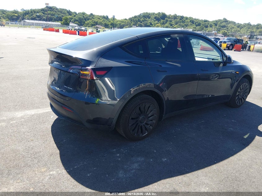 2024 Tesla Model y VIN 7SAYGDEE4RF026385 IAAI salvage auction — LEFT REAR, Salvage (Illinois), sold $14,050 on 2026-07-30 (photo 4)