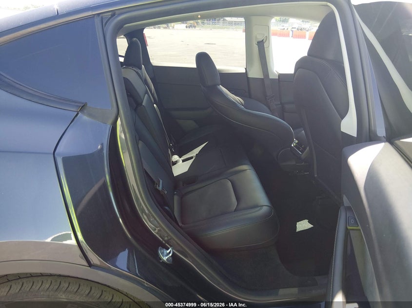 2024 Tesla Model y VIN 7SAYGDEE4RF026385 IAAI salvage auction — LEFT REAR, Salvage (Illinois), sold $14,050 on 2026-07-30 (photo 8)