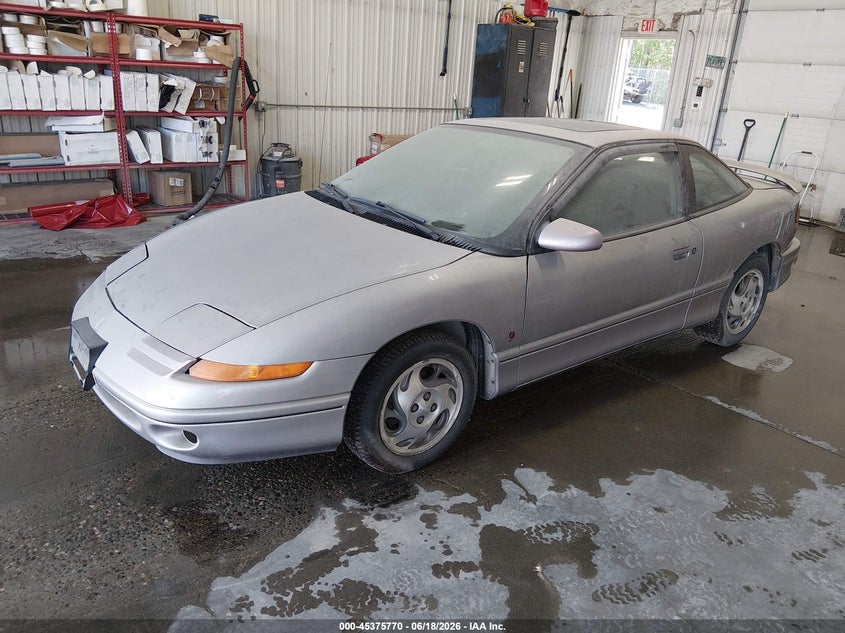 1996 Saturn Sc2 VIN 1G8ZH1273TZ220534 IAAI salvage auction — REAR END, Original (Alaska), sold $200 on 2026-07-10 (photo 2)
