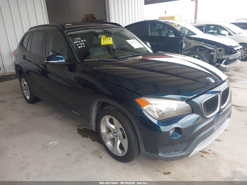 2014 BMW X1 VIN WBAVM1C53EVW47118 IAAI salvage auction — WATER/FLOOD, Salvage (Texas), sold $925 on 2026-07-24 (photo 1)