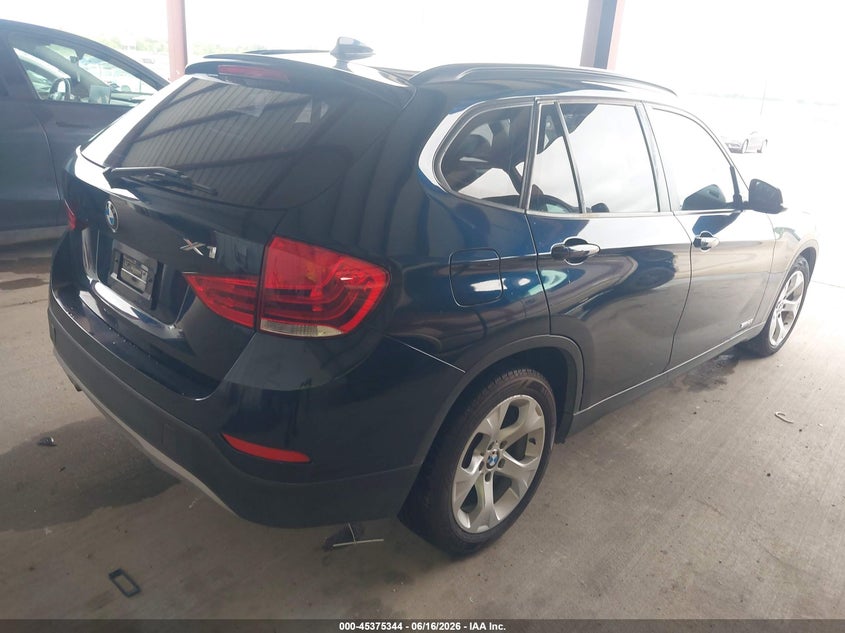 2014 BMW X1 VIN WBAVM1C53EVW47118 IAAI salvage auction — WATER/FLOOD, Salvage (Texas), sold $925 on 2026-07-24 (photo 4)