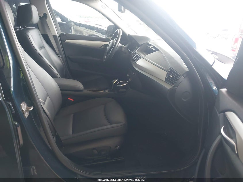 2014 BMW X1 VIN WBAVM1C53EVW47118 IAAI salvage auction — WATER/FLOOD, Salvage (Texas), sold $925 on 2026-07-24 (photo 5)