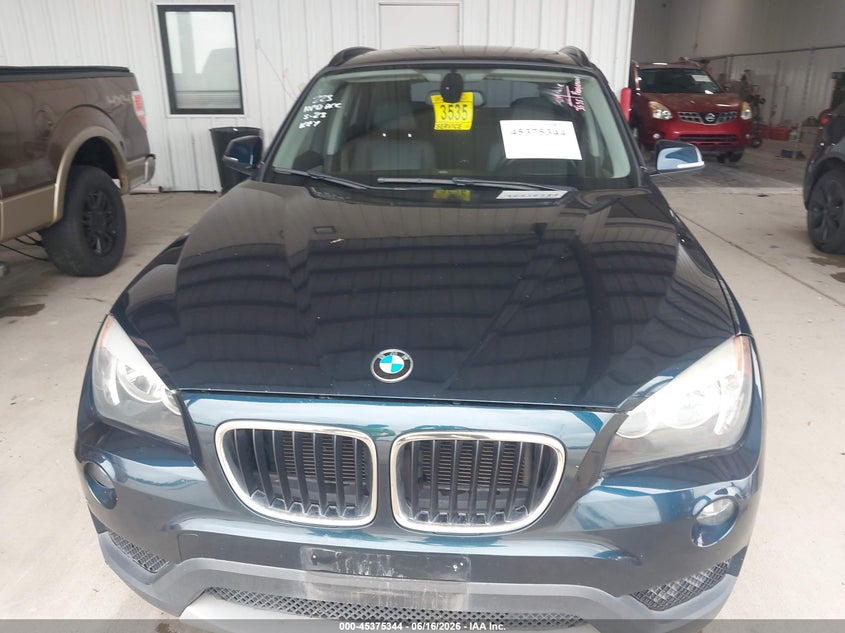 2014 BMW X1 VIN WBAVM1C53EVW47118 IAAI salvage auction — WATER/FLOOD, Salvage (Texas), sold $925 on 2026-07-24 (photo 6)