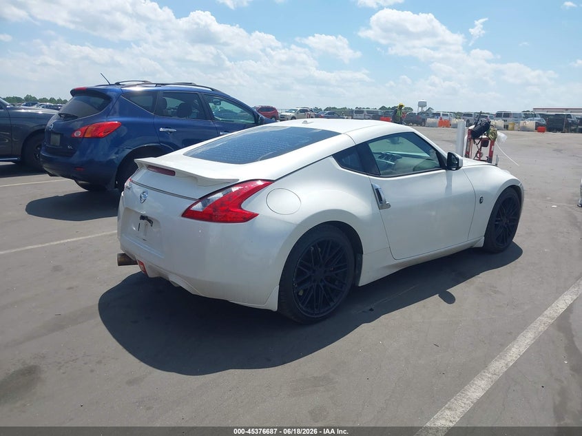 2009 Nissan 370z VIN JN1AZ44E49M403009 IAAI salvage auction — LEFT SIDE, Salvage (Idaho), sold $25 on 2026-07-29 (photo 4)