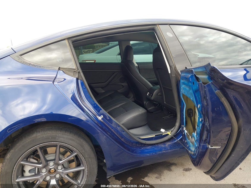 2023 Tesla Model 3 VIN 5YJ3E1EA3PF585576 IAAI salvage auction — RIGHT REAR, Salvage Title, sold $8,000 on 2026-08-03 (photo 8)