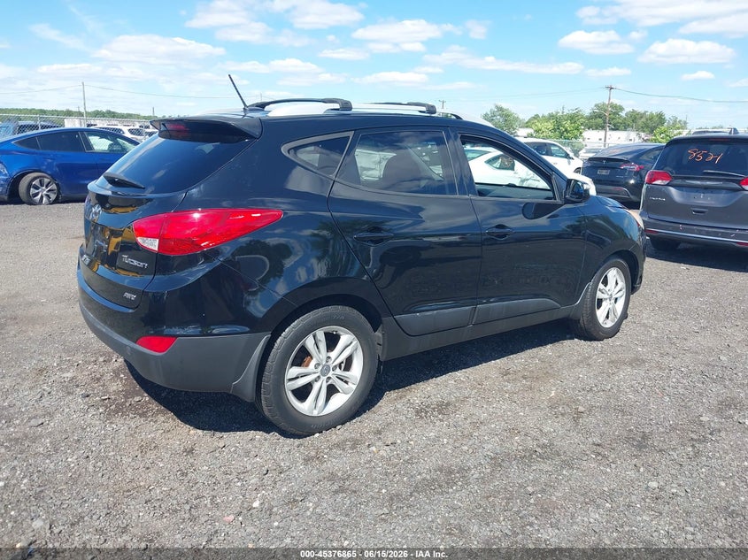 2012 Hyundai Tucson VIN KM8JUCAC5CU541850 IAAI salvage auction — NORMAL WEAR, Clear (New Jersey), sold $1,350 on 2026-07-13 (photo 4)