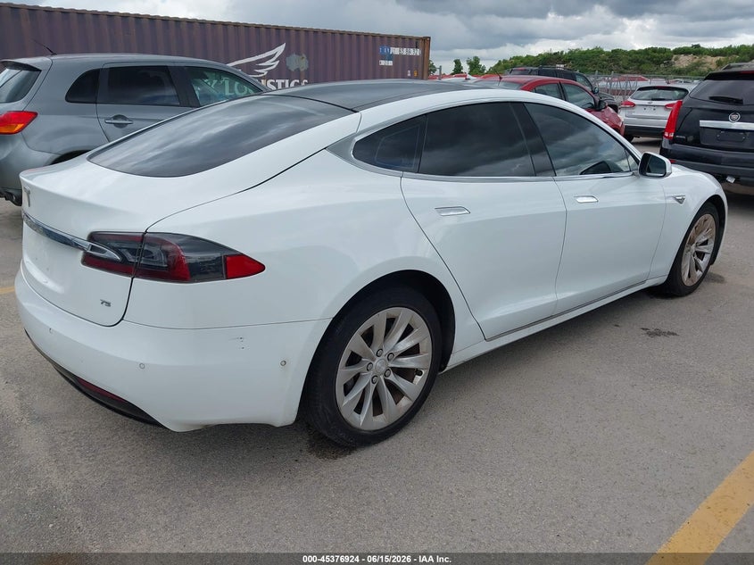 2016 Tesla Model s VIN 5YJSA1E16GF152390 IAAI salvage auction — NORMAL WEAR, Clear (Texas), sold $7,000 on 2026-07-09 (photo 4)
