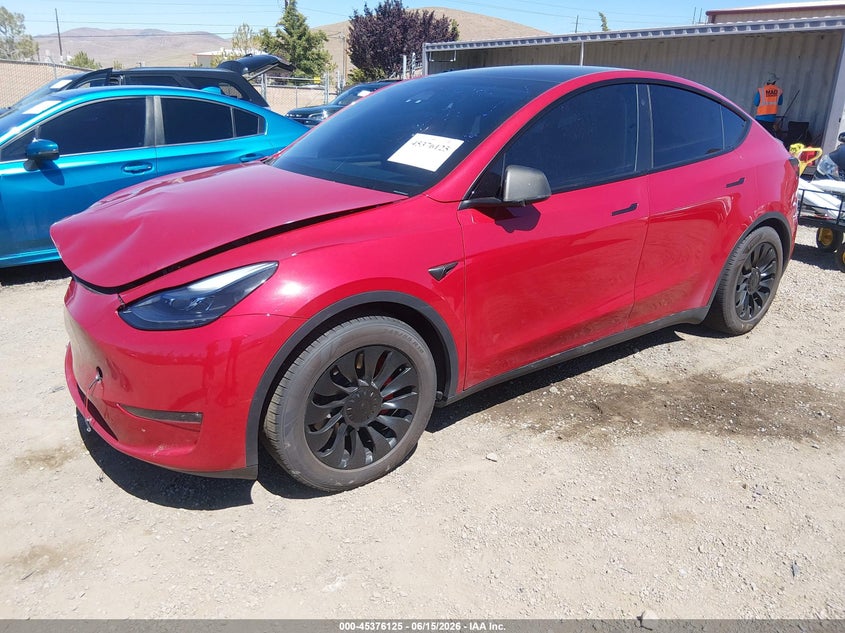 2023 Tesla Model y VIN 7SAYGDEF7PF632110 IAAI salvage auction — FRONT END, Salvage (Nevada), sold $8,850 on 2026-07-30 (photo 2)