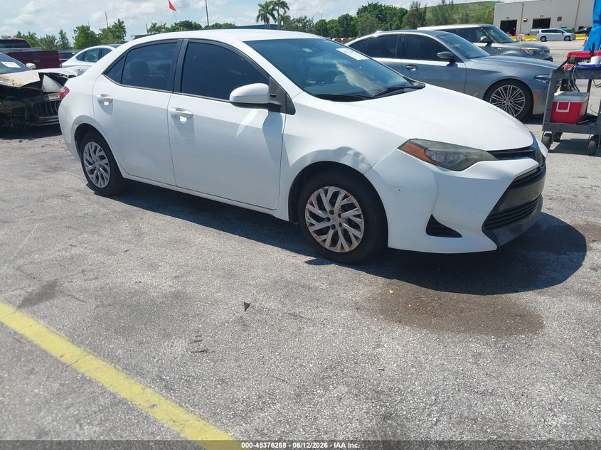 2018 Toyota Corolla VIN 5YFBURHE5JP770798 IAAI salvage auction — NORMAL WEAR, Clear (Florida), sold $2,400 on 2026-07-09 (photo 1)