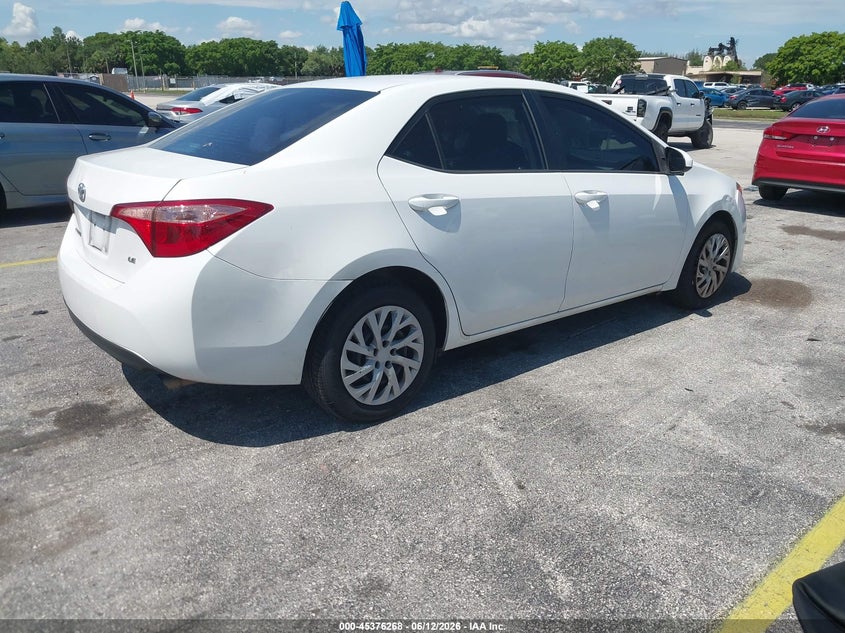 2018 Toyota Corolla VIN 5YFBURHE5JP770798 IAAI salvage auction — NORMAL WEAR, Clear (Florida), sold $2,400 on 2026-07-09 (photo 4)