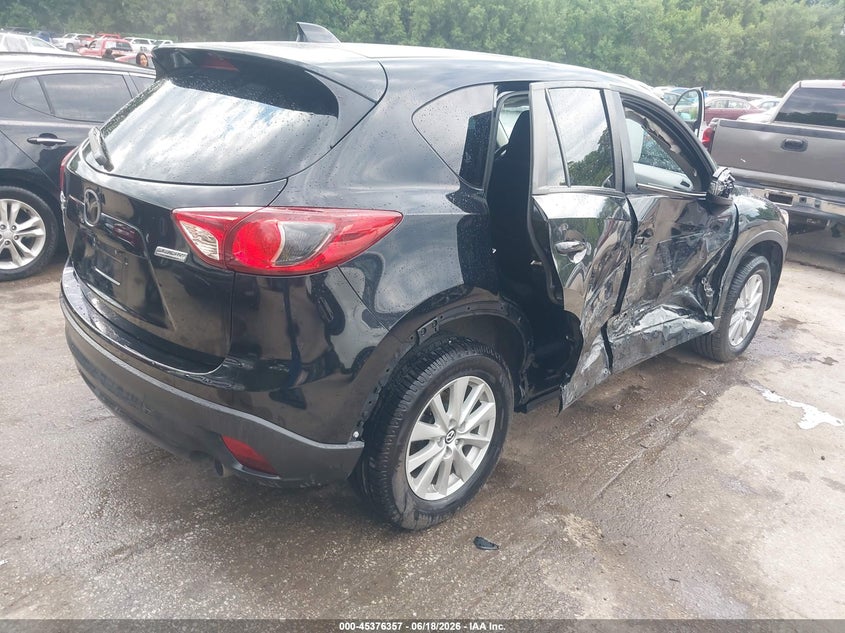 2014 Mazda Cx-5 VIN JM3KE4CYXE0402321 IAAI salvage auction — SIDE, Salvage (Missouri), sold $2,700 on 2026-07-22 (photo 4)