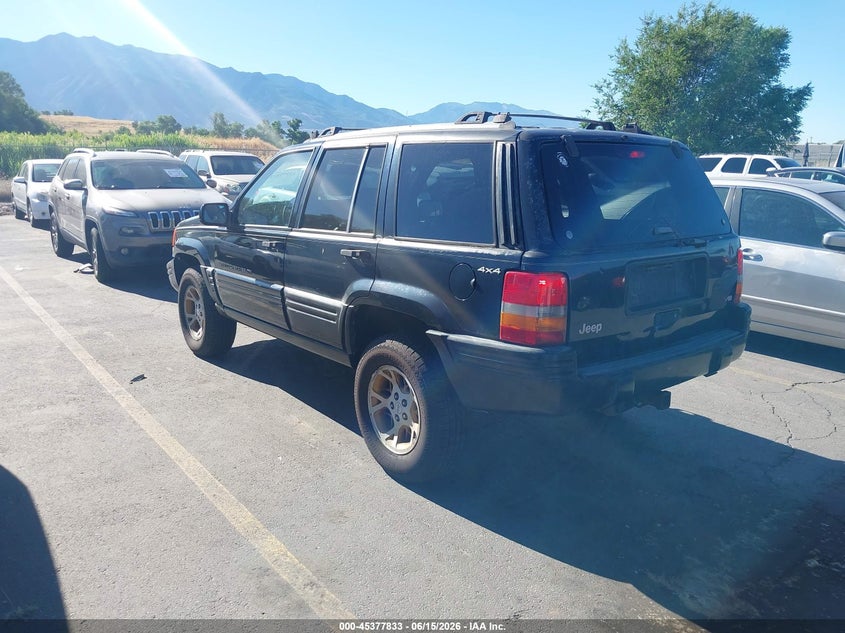 1996 Jeep Grand cherokee VIN 1J4GZ78Y9TC236134 IAAI salvage auction — FRONT & REAR, Clear (Utah), sold $275 on 2026-07-09 (photo 3)
