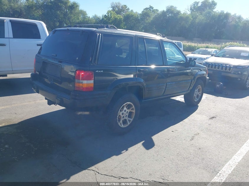 1996 Jeep Grand cherokee VIN 1J4GZ78Y9TC236134 IAAI salvage auction — FRONT & REAR, Clear (Utah), sold $275 on 2026-07-09 (photo 4)