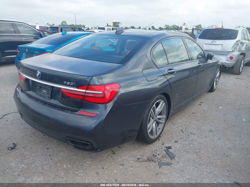 2017 BMW 7er VIN WBA7F2C32HG422771 IAAI salvage auction — ENGINE DAMAGE, Original (Texas), sold $4,750 on 2026-09-07 (photo 4)