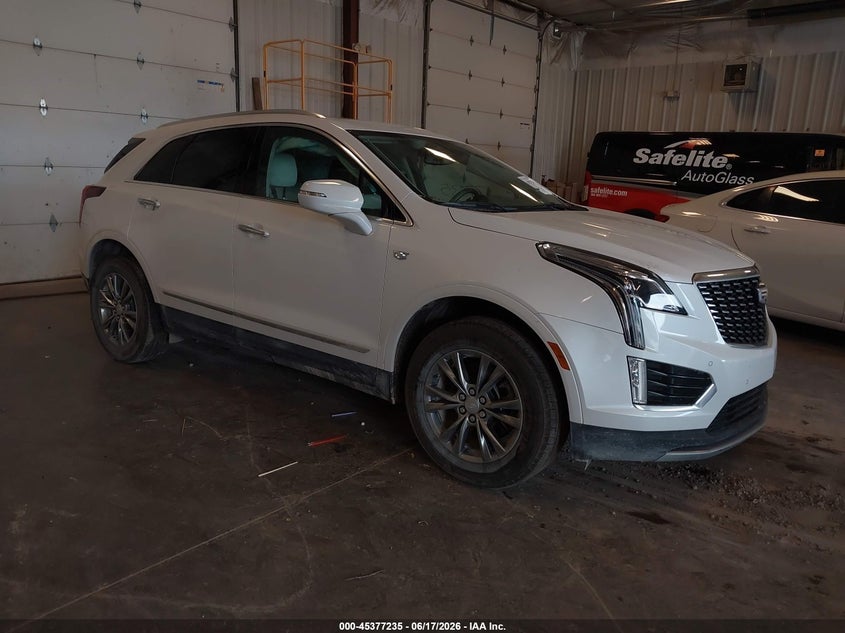 2023 Cadillac Xt5 VIN 1GYKNDR4XPZ191983 IAAI salvage auction — LEFT SIDE, Clear (Michigan), sold $6,600 on 2026-07-29 (photo 1)